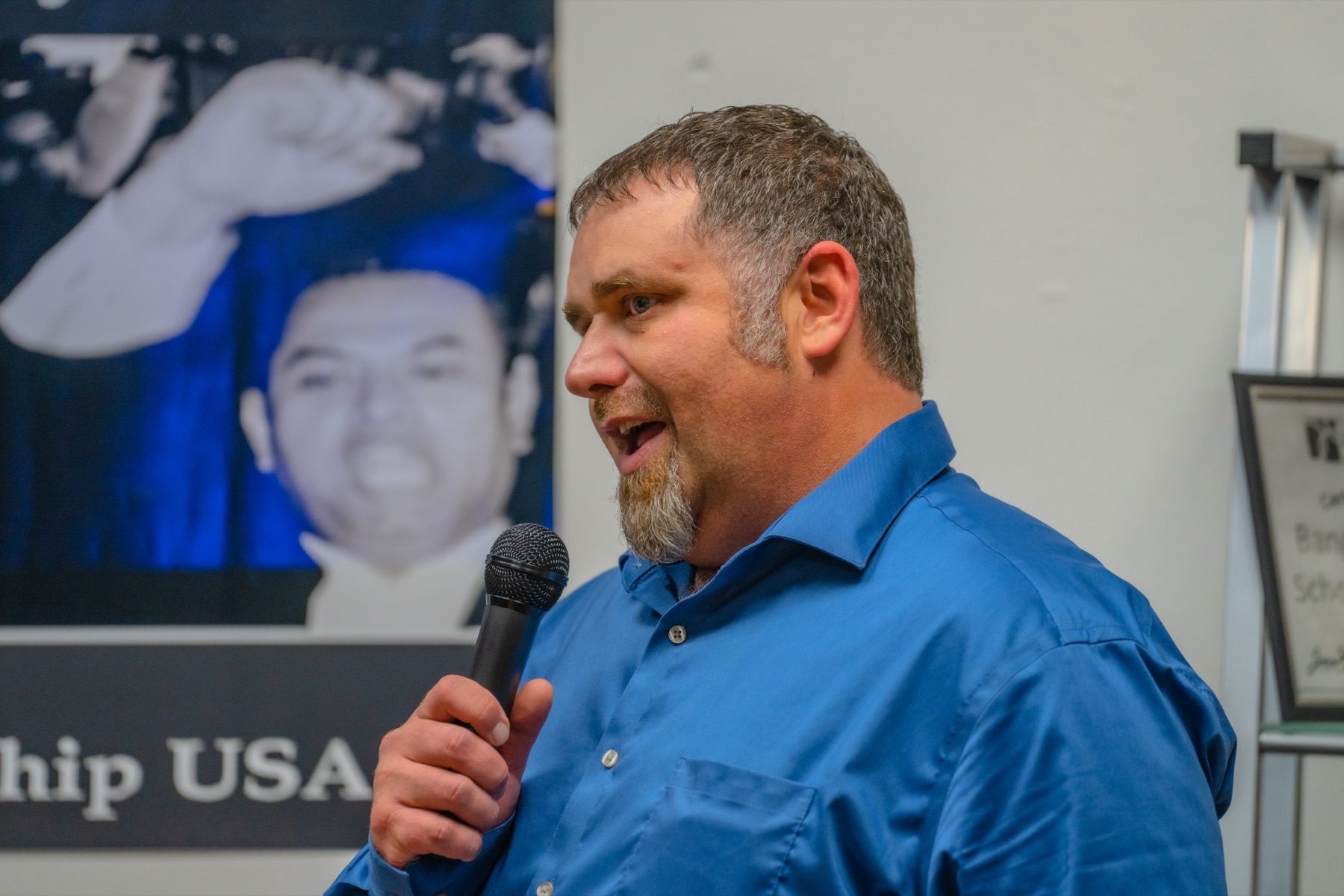 Nathan speaking at a live event